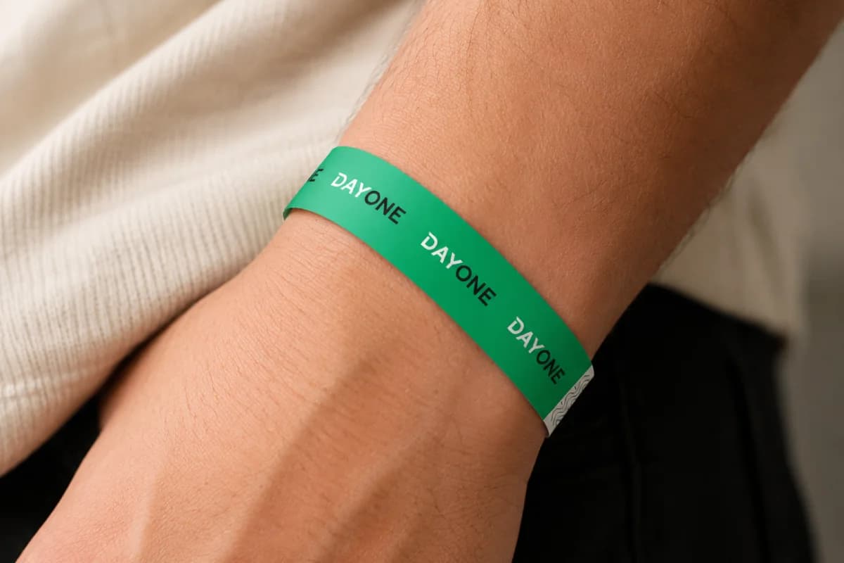 Customer wearing a green custom printed wristband